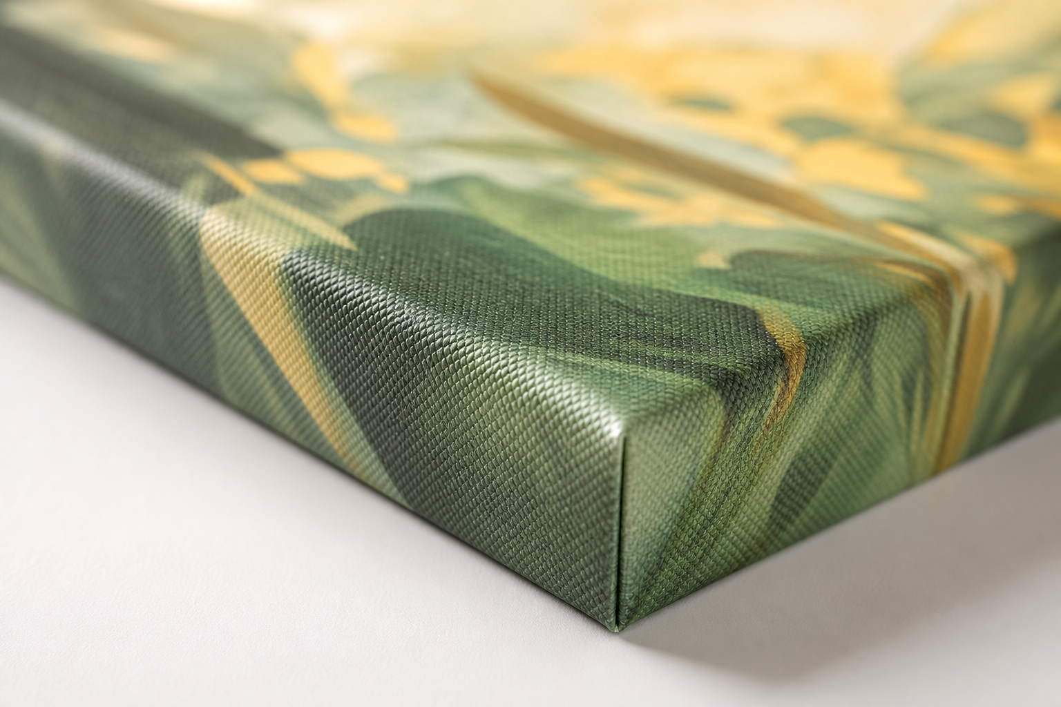 Close-up of a stretched canvas with colorful print on a wooden frame